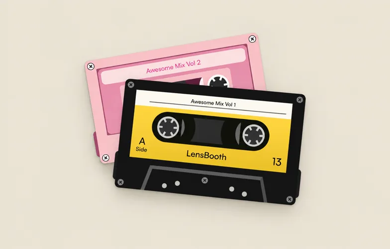 Two cassette tapes labelled Awesome Mix, one pink and one yellow